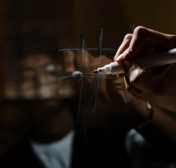 guy drawing a hashtag